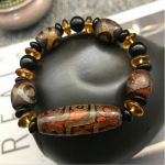 Браслет "5 античных бусин ДЗИ" 9 глаз с янтарём