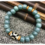 Браслет "Белая ДЗИ" 3 глаза из зелёного нефрита