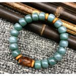 Браслет "Коричневая ДЗИ" 3 глаза из зелёного нефрита